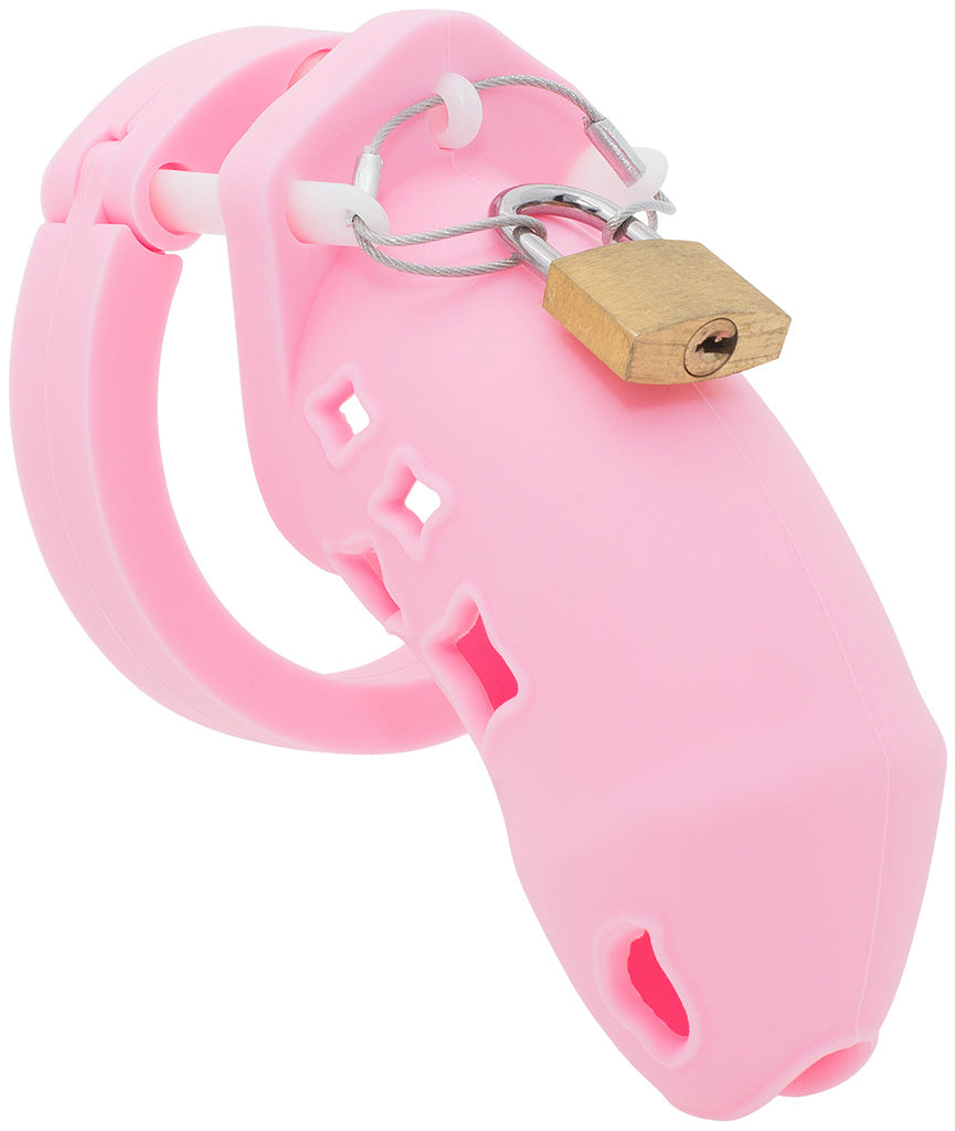 A pink HoD602 silicone chastity cage kit with a brass padlock.